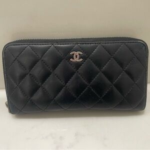 CHANEL Quilted Zip Around Wallet • Black Lambskin • Silver Hardware